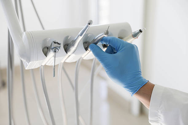 Professional Tooth Extraction technician working in Saint John's University, MN
